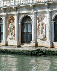 Ancient door and facade, Venice, Italy