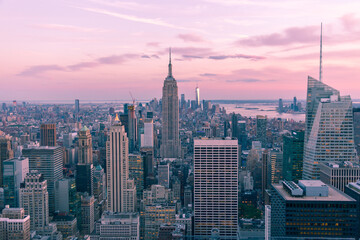 Aerial view of New York city at night, Manhattan, USA, magenta toned