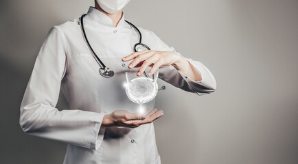 Unrecognizable doctor holding highlighted handrawn Bladder in hands. Medical illustration,...