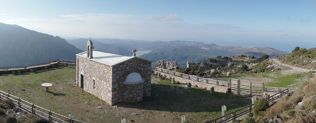 Lasithi Plateau mountain landscapes with cloudy sky on Crete Island in Greece.