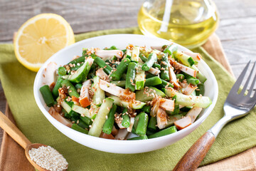 Salad with green beans, chicken and cucumber. Hearty lunch