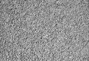 Small crushed stone as an abstract gray background.