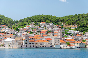 Fototapeta na wymiar Picturesque bay of Pucisca. Pucisca lies at the end of deep natural bay on the northern coast of Brac island in Croatia.