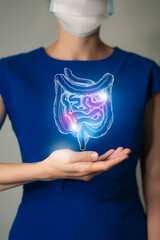 Unrecognizable woman in blue clothes holding highlighted handrawn Intestine in hands. Medical illustration, template, science mockup.