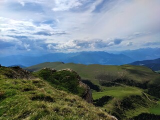 Fototapeta premium mountain landscape with clouds, Seceda, Dolomites, travel in Trentino Alto Adige