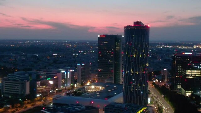 Aerial close-up of Bucharest business district skyscrapers at dusk