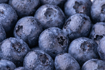 Blueberries closeup with water drops, food background, blueberries background
