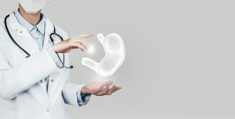 Unrecognizable doctor holding highlighted handrawn Stomach in hands. Medical illustration,...