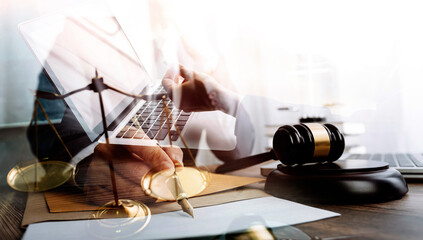 Business and lawyers discussing contract papers with brass scale on desk in office. Law, legal...