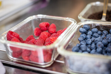 Blueberries and raspberries in the bowl.
