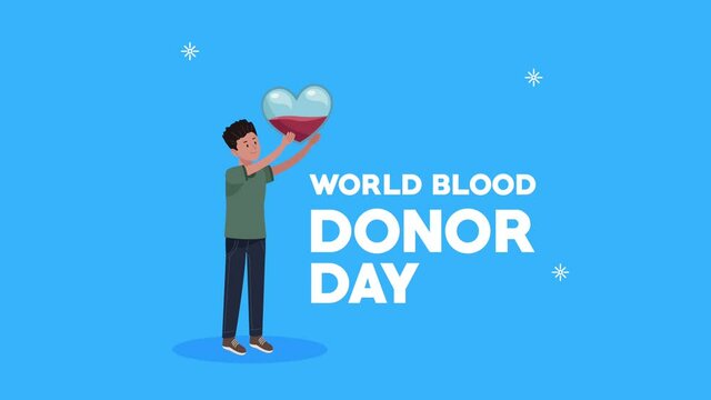 world blood donor day lettering with man holding heart