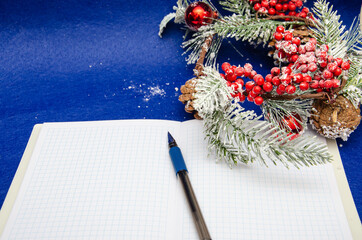 Christmas decoration on blue background. letter for Santa Claus, top view and space for text