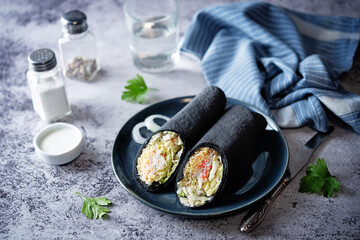 Crab meat lettuce lettuce cheese black tortilla