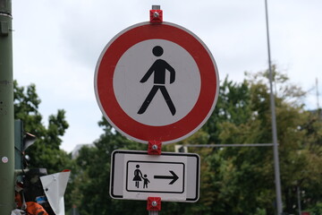 no pedestrian allowed sign with direction to detour