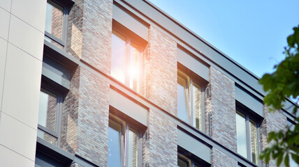 Detailed view of modern townhouses in row of. Original townhouses in a residential area. Buildings predominantly made of glass, steel and concrete.