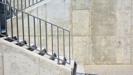 Modern concrete stairs and metal railings outside
