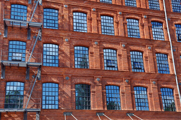 old brick factory building rebuilt as hotel in Lodz