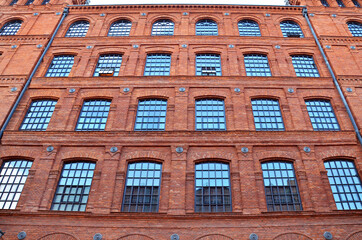 old brick factory building rebuilt as hotel in Lodz