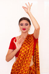 Young beautiful woman with Indian make up and style