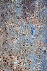 Old light blue painted grey rusty rustic rust iron metal background texture, vertical aged damaged...