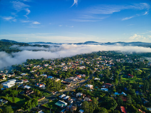 Sunrise in a caribbean country Jarabacoa, Dominican Republic with low clouds