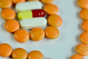 colorful pills on a white