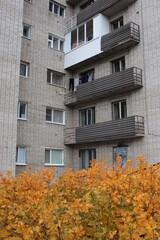 Russia, Novosibirsk 01.10.2019: multi-storey residential building in the city with balconies on the facade