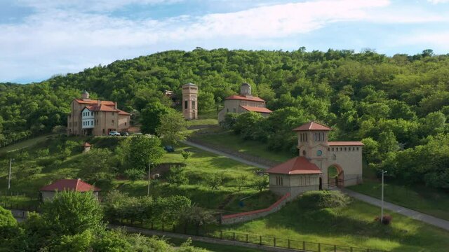 Aerial View Of Srediste Monastery With The Green Mountain In Banat, Serbia.