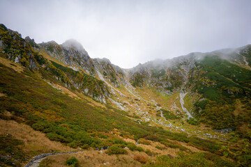 長野県上松町、木曽町、宮田村の木曽駒ヶ岳や千畳敷カールを登山している風景 Scenery of climbing Kiso Komagatake and Senjojiki Cirque in Uematsu Town, Kiso Town and Miyata Village, Nagano Prefecture.