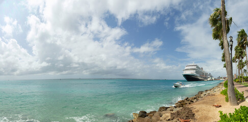 Panoramic view of the ocean and cruise ships in port in Aruba.