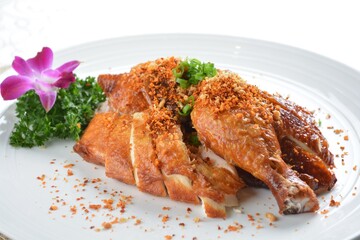 roasted bbq golden crispy whole chicken meat with crackers in white background asian halal menu