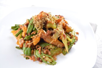 stir fried mixed vegetables with meat in spicy samba chilli sauce in white background asian halal menu