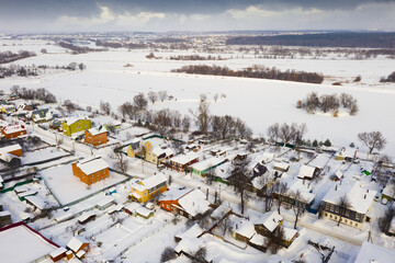 Top view over city Bronnitsy in winter day. View from above. Russia