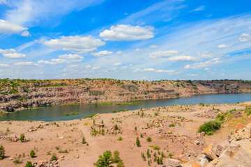 View of the lake at abandoned quarry on summer