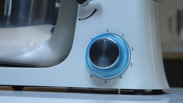 white mixer ketchen applinces knob speed dial.