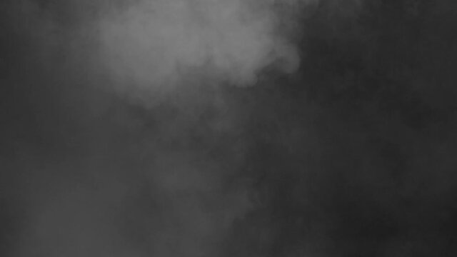 soft Fog in Slow Motion on Dark Backdrop. Realistic Atmospheric Gray Smoke on Black Background. White Fume Slowly Floating Rises Up. Abstract Haze Cloud. Animation Mist Effect. Smoke Stream Effect 4K.