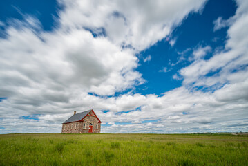 The historic stone Fairview United Church, built in 1903, and surrounding countryside, outside...