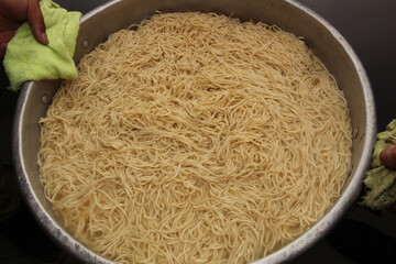 Wafu japanese pasta being prepared ina kitchen restaurant