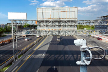 CCTV cameras on the overpass for recording on the road for safety and traffic violations