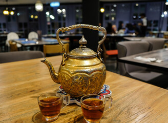 Tea is usually served after a sumptuous meal at an Arabian restaurant. Arabic Tea. Tea denotes...