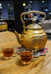 Tea is usually served after a sumptuous meal at an Arabian restaurant. Arabic Tea. Tea denotes hospitality and usually goes with sweet dates.