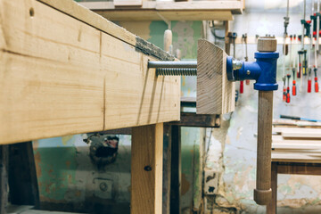 Close up of press tool at traditional vintage carpentry workshop studio