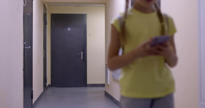 man chasing girl in entrance. Victims are children of rapist. Hostages are little children. illegal detention. child trafficking. caucasian maniac pedophile following, chasing child girl, kidnapping