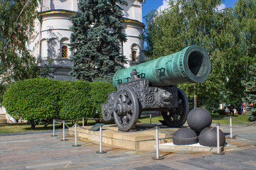 MOSCOW, RUSSIA-AUGUST, 4, 2021: a large bronze tsar cannon and cannonballs on Sobornaya Square in...