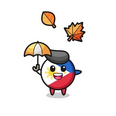 cartoon of the cute philippines flag badge holding an umbrella in autumn