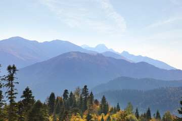 Mountain range in the blue haze of an autumn morning