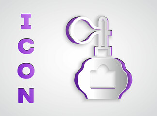 Paper cut Aftershave bottle with atomizer icon isolated on grey background. Cologne spray icon. Male perfume bottle. Paper art style. Vector