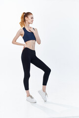 Fototapeta na wymiar athletic woman workout active sport jumping light background