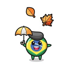 cartoon of the cute brazil flag badge holding an umbrella in autumn
