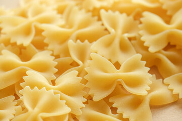 Closeup dry macaroni background. Textured kitchen background